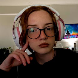 Young Female Wearing Headphones with Gaming Glasses