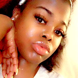 A Beautiful Woman with Curly Hair and Dark Eyes