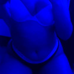 Barbie, the Onlyfans Model, in a Blue Lighted Environment