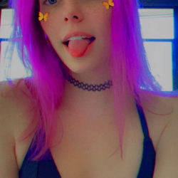 OnlyFans Model AkaAralynn Poses with Pink Hair and Tattoo