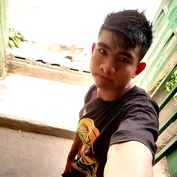 Teenager Posing for Selfie in Alleyway