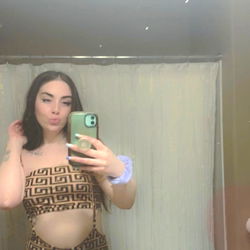 Model in a Bathroom Mirror