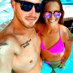 Couple Posing for Selfie in Pool