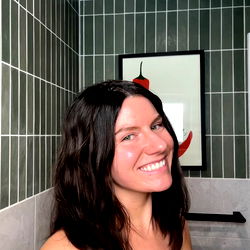 Young Adult Woman Smiling at Camera