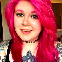 Bright Pink Hair With Black Tattooed Designs