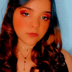 An OnlyFans Model, Angeles, Posed in a Stylized Photo