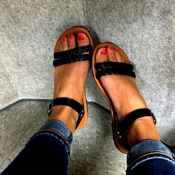 Woman in Sandals Sharing Feet for Social Media