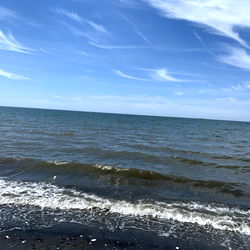 Beach Scenery with Sky Reflections on Water