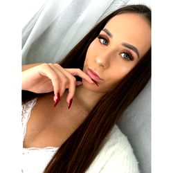 Stylish Model Kateřina Posing with Finger on Lip