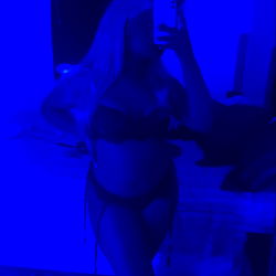 OnlyFans Model Nayski Shares Her Photoshoot in a Blue Room