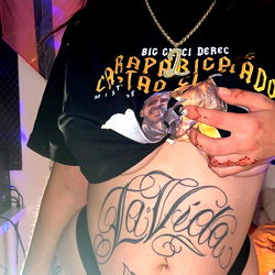 Adult Model La Santa Showcases Tattoos