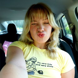 Bella3: A Playful, Yellow-Haired Model