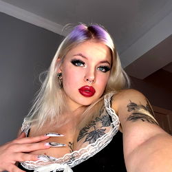 Rita, a stunning OnlyFans model with vibrant purple hair
