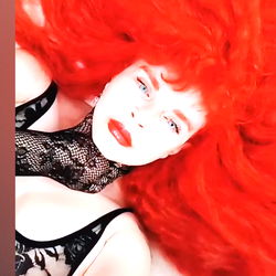 Striking Red Hair in OnlyFans Model Photo