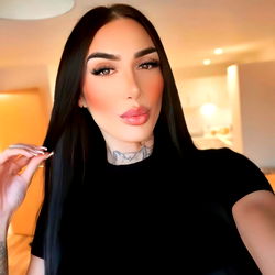 OnlyFans Model with Dark Hair and Tattoo