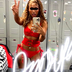 Amoura Lanae: Striking a Pose in Her OnlyFans Outfit