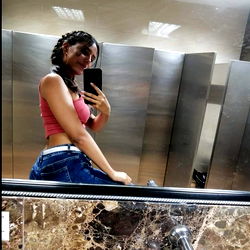 Stylish Model Steph Ortiz Striking a Pose in Elevator