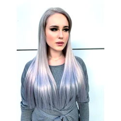 Apollinaria in a gray sweater and silver-gray hair