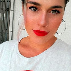 Aesthetic April, with a vibrant pop of color, showcasing her unique personal style. 