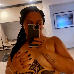 Tattooed OnlyFans Model in Bikini