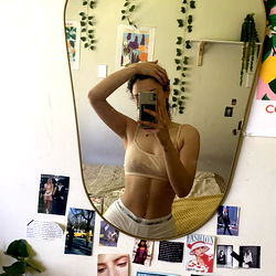 Model Adrienne Captured in Mirror Selfie