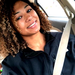 Young Adult Woman Posing in Car