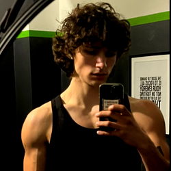 Alex, 25, Male Model Taking a Mirror Selfie in Prague