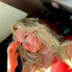 Stylish Model in Bikini on Car Dashboard