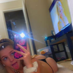 Amber Satin: Playful and Confident in Bathing Suit