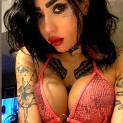 Translosi in a Pink and Purple Bra