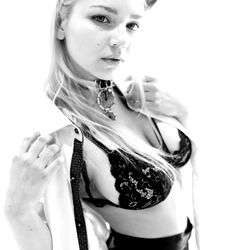 Araksin: Erotic Fashion Model Showcasing Lingerie and Catsuit