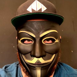 Vigilant Vibes: A Man's Tribute to Anonymity with a Black Mask and Vigilante Mask Set