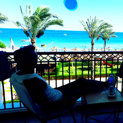 Enjoying Ocean Views on a Balcony