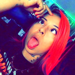 Vivid Tattoos of Woman with Red Hair and Stunna Sunglasses