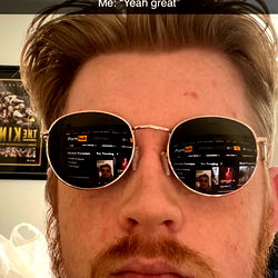 Bearded Man in Shades, Taking a Selfie with Instagram