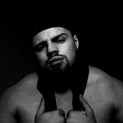 Filip David, a Bodybuilder Posing for an OnlyFans Photo