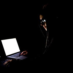 OnlyFans Model Ambitious Dreamer in Stealth Mode with Laptop