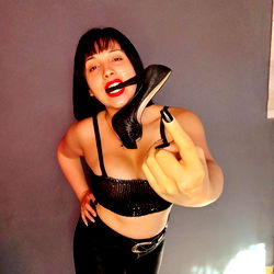 Fetish Model in Black Leather Outfit