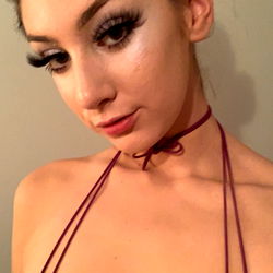 OnlyFans Model Alita in Elegant Purple Crop Top and Strap Necklace