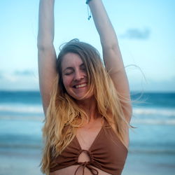 Joyful beach moment, Aspen shares her favorite location