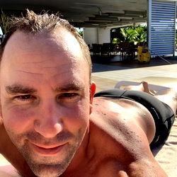 Adam - A Man Relaxing at the Beach