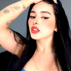 Cute OnlyFans Model with Tattoos and Long Hair