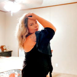 OnlyFans Model Posing in Bedroom