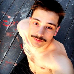 OnlyFans Model Tommy Oak in a Casual Shirtless Pose