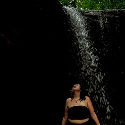 Intimate Moment with Snow Bunny Amidst a Waterfall