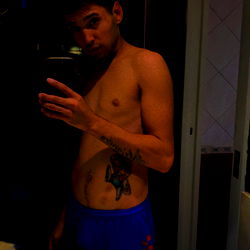 An OnlyFans Model in a Bathroom Mirror