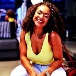 Smiling OnlyFans Model in a Casual Setting