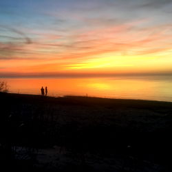 Hails Model Beach Scene at Sunset