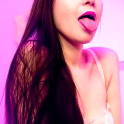 Vivid AnnaVision: A Model Photoshoot in a Purple Room