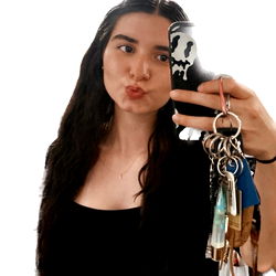 OnlyFans Model with Long Dark Hair Taking a Selfie